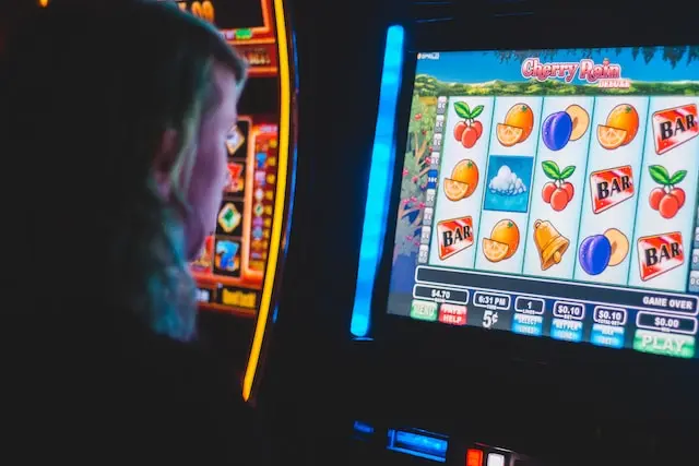 Woman playing an online slot machine connected to internet