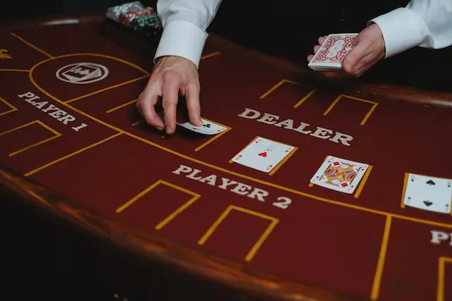 Dealing cards in Casino Poker Hold’em 5 community cards from the dealer.